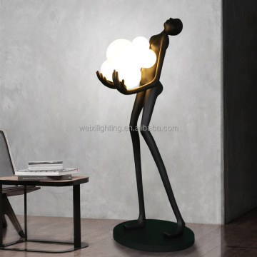 Lampadaire décoratif en résine sculpture avec silhouette à balle