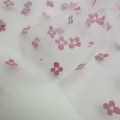 Tessuto in tulle velato in nylon con fiori di prugna con stampa in schiuma