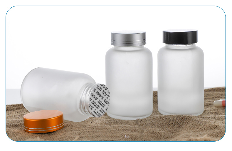 120ml transparent glass bottle in packaging context