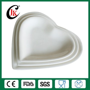 Wholesale white heart shaped ceramic dinner plate set                
                                    Quality Assured