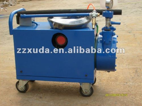 Low cost piston grout pump