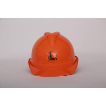 Orange construction site safety helmet