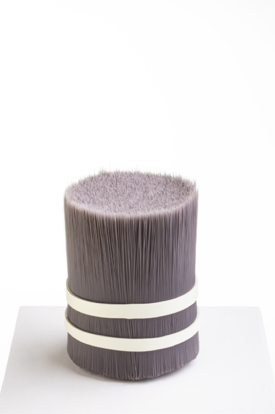 Mixed tapered brush bristles for shoes cleaning brush