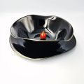 Elegante juego de platos de vaso negro irregular