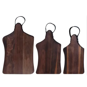 Walnut wood chopping board with leather handle