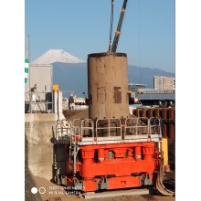 Occluded pile with full rotary casing drilling rig