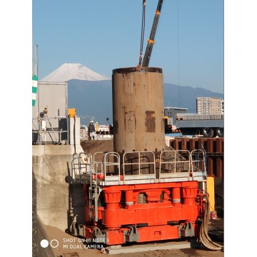 Occluded pile with full rotary casing drilling rig