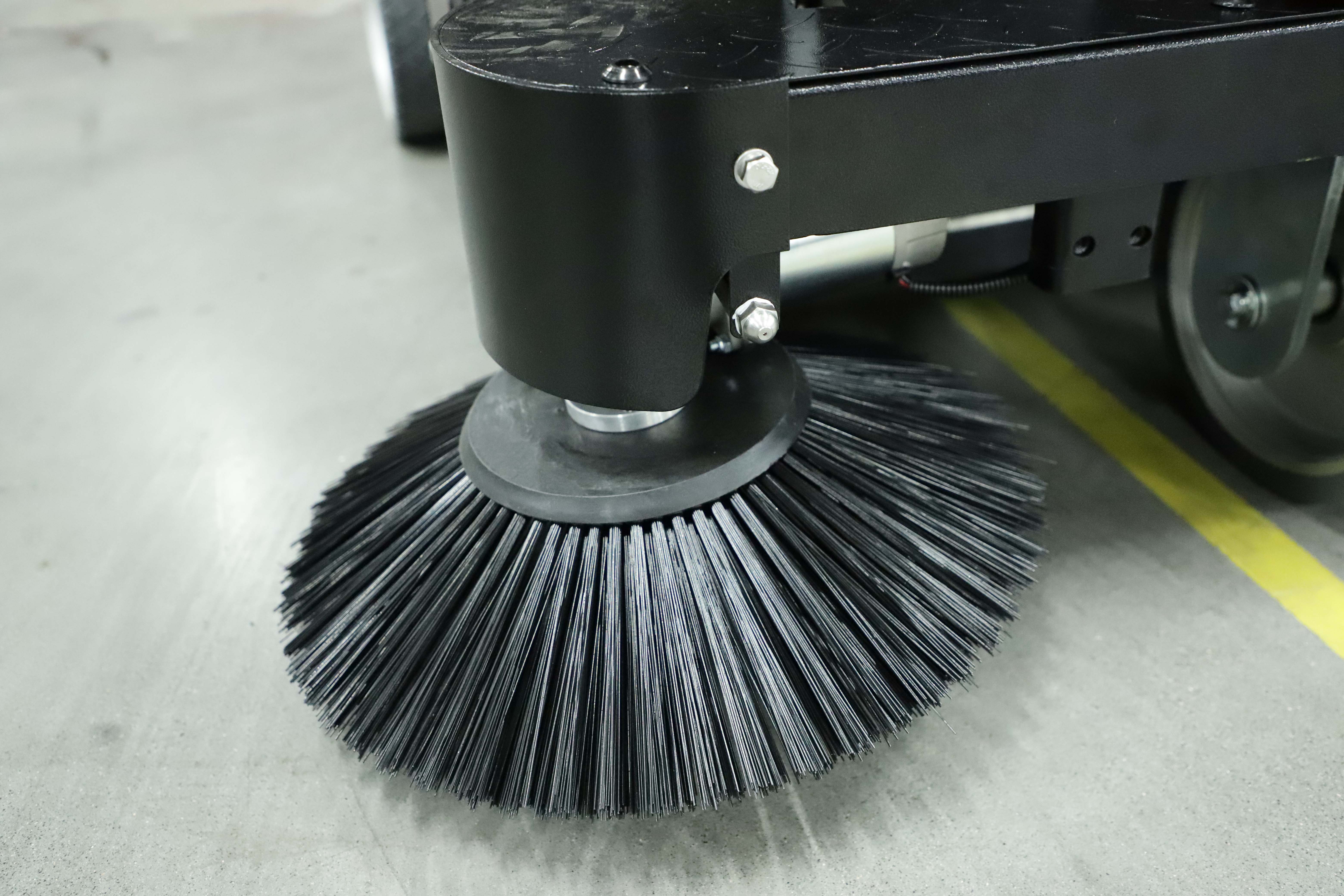 Ride-on floor sweeper