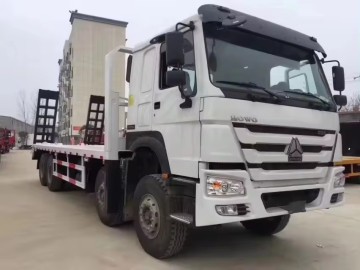 Sinotruk HOWO 8X4 12 Wheels Flat Bed Truck for Heavy Equipment Machinery Transportation