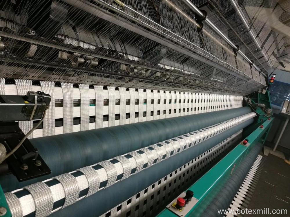 Warp knitting machine for geogrid