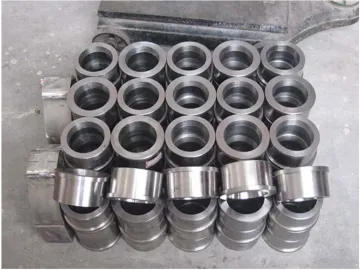 Roll sleeves and bushes