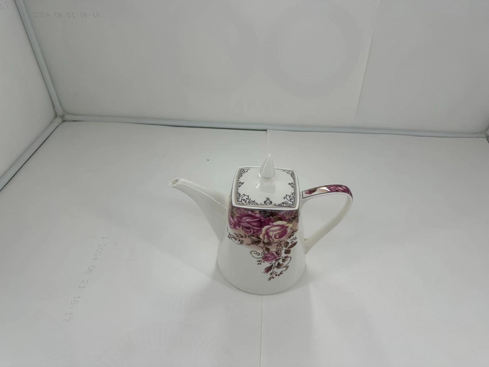 Ceramic kettle with spout