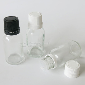 Small european glass bottles with tamper evident lids clear