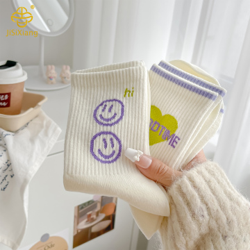 Korean version colored letter tube socks with smiling face and sporty style