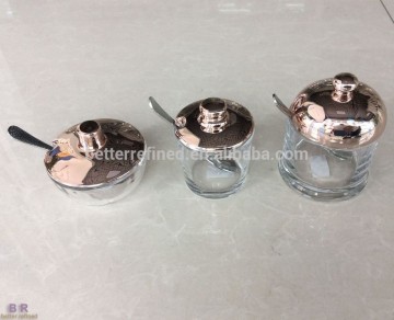 Glass sugar bowls with metallic lid