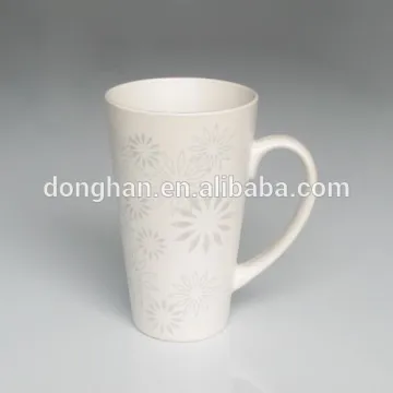 white ceramic beer mug