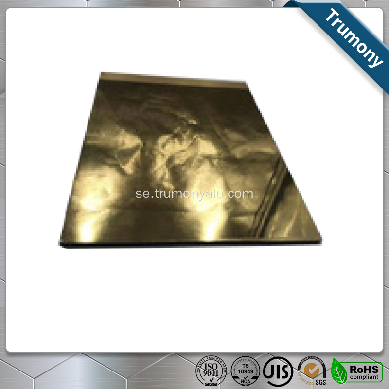 Kompositpanel av gyllene aluminiumspegel