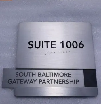 ADA signages with braille and raised lettering