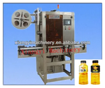 Automatic sleeve labeling machine