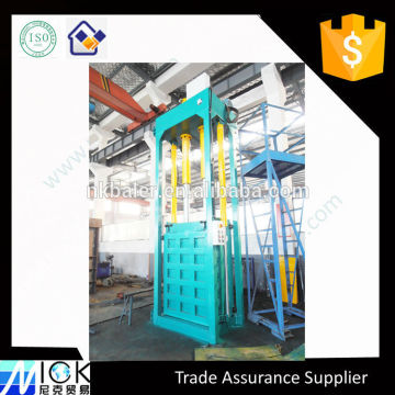 Curtain vertical baler