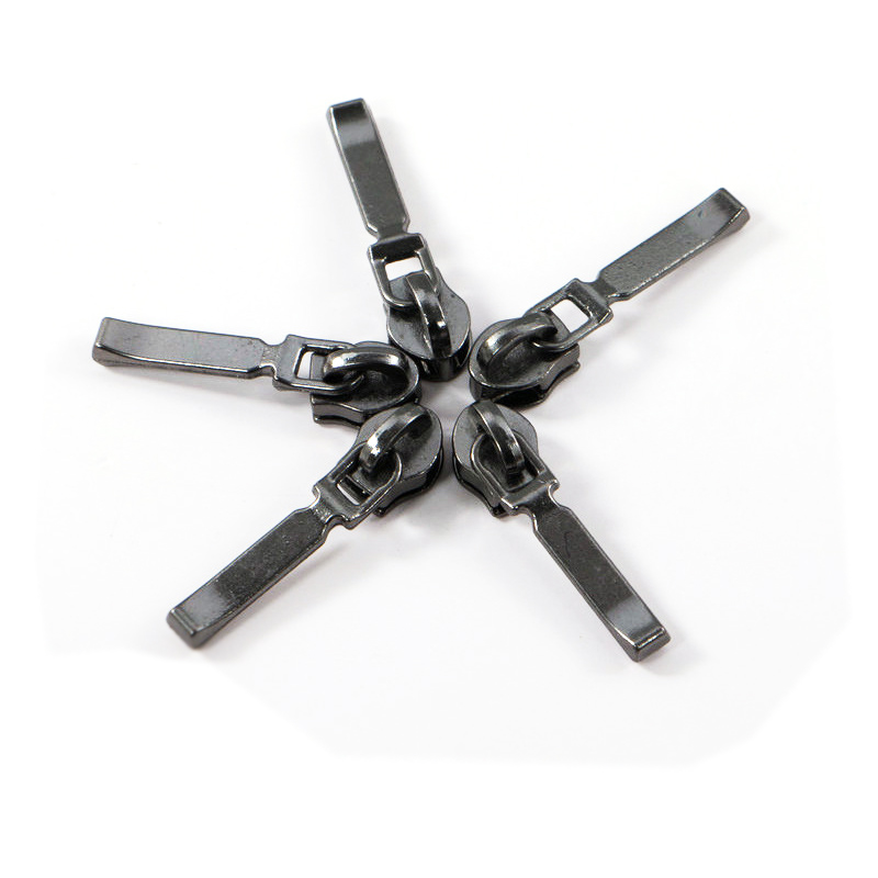 Metal zipper head