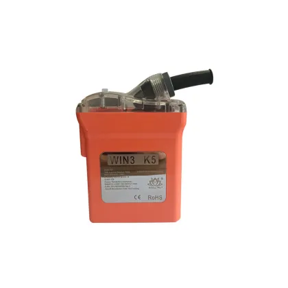 Corded  cap lamp with laser