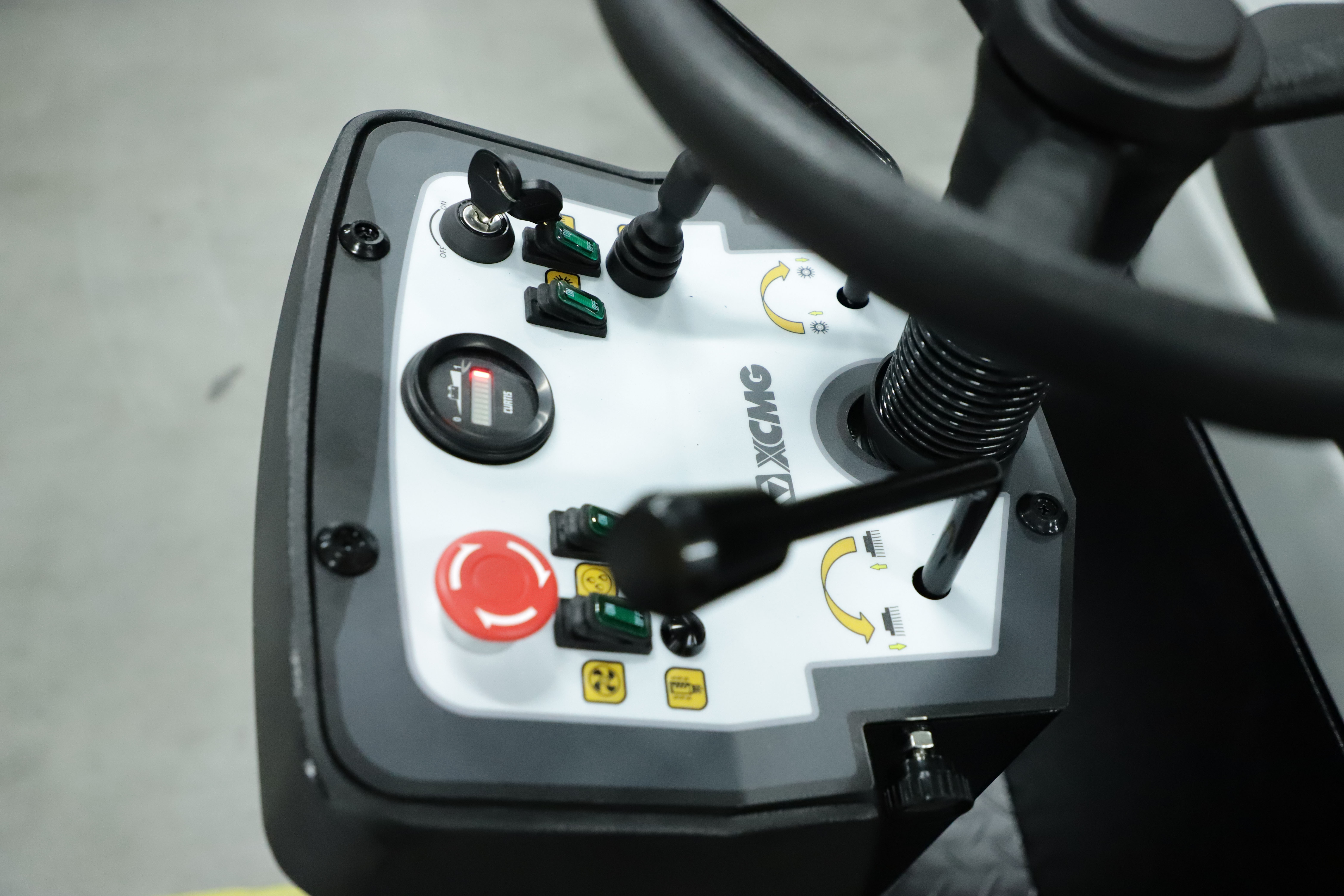 Ride-on floor sweeper