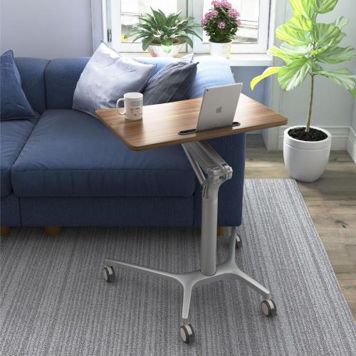 Portable height adjustable bed table