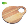 Tabla de corte de madera de acacia preciosa oval con mango