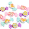 Venta caliente Kawaii corazón caramelo resina cabujón cuentas traseras planas para decoración artesanal hecha a mano cuentas encantos adornos de habitación espaciador