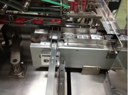 Automatic condom cartoning machine