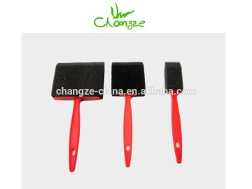 Foam paint brush with plastic handle