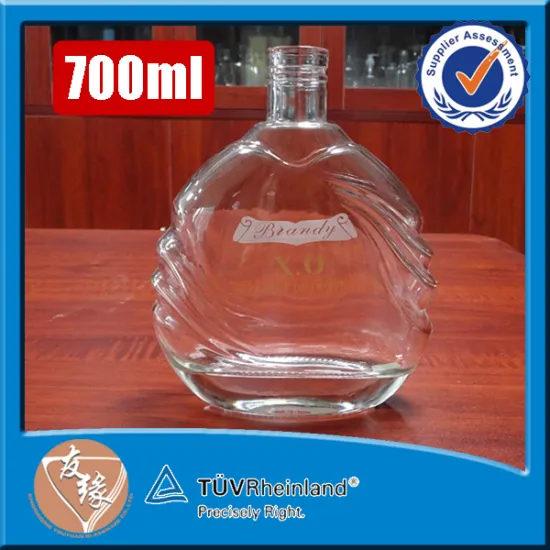 Wholesale decal frosting decorated xo liquor bottle round 700ml glass bottle clear
