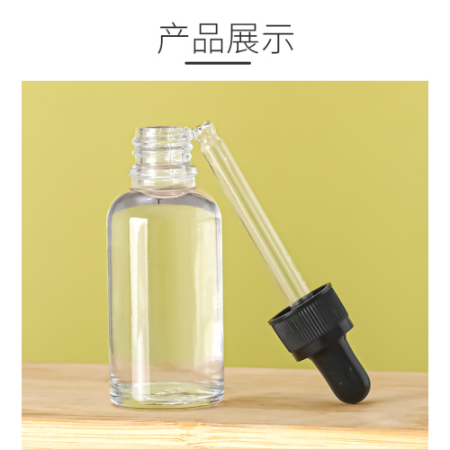 Garrafa separada com conta -gotas de vidro transparente