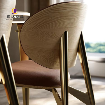 Stainless Steel Dining Table Set with Modern Minimalist Cowhide Leather Chairs