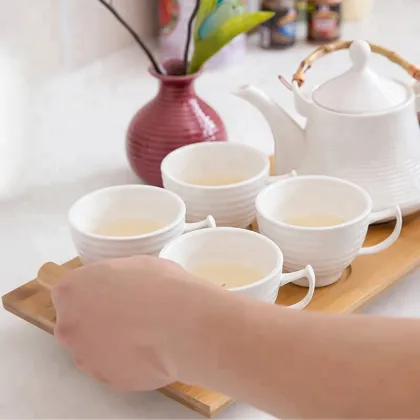 White Porcelain Tea Cup and Saucer Set with Tray