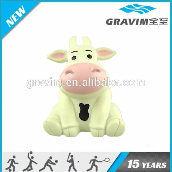 The plastic piggy bank with cow shaped