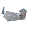 Sludge dewatering screw filter press