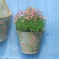 Wrought iron wall hanging painted feather iron bucket