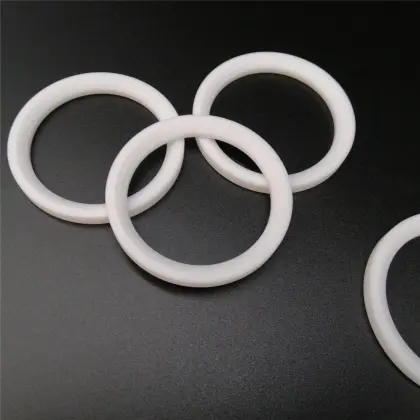 Filled PTFE enhanced low friction ball valve seat