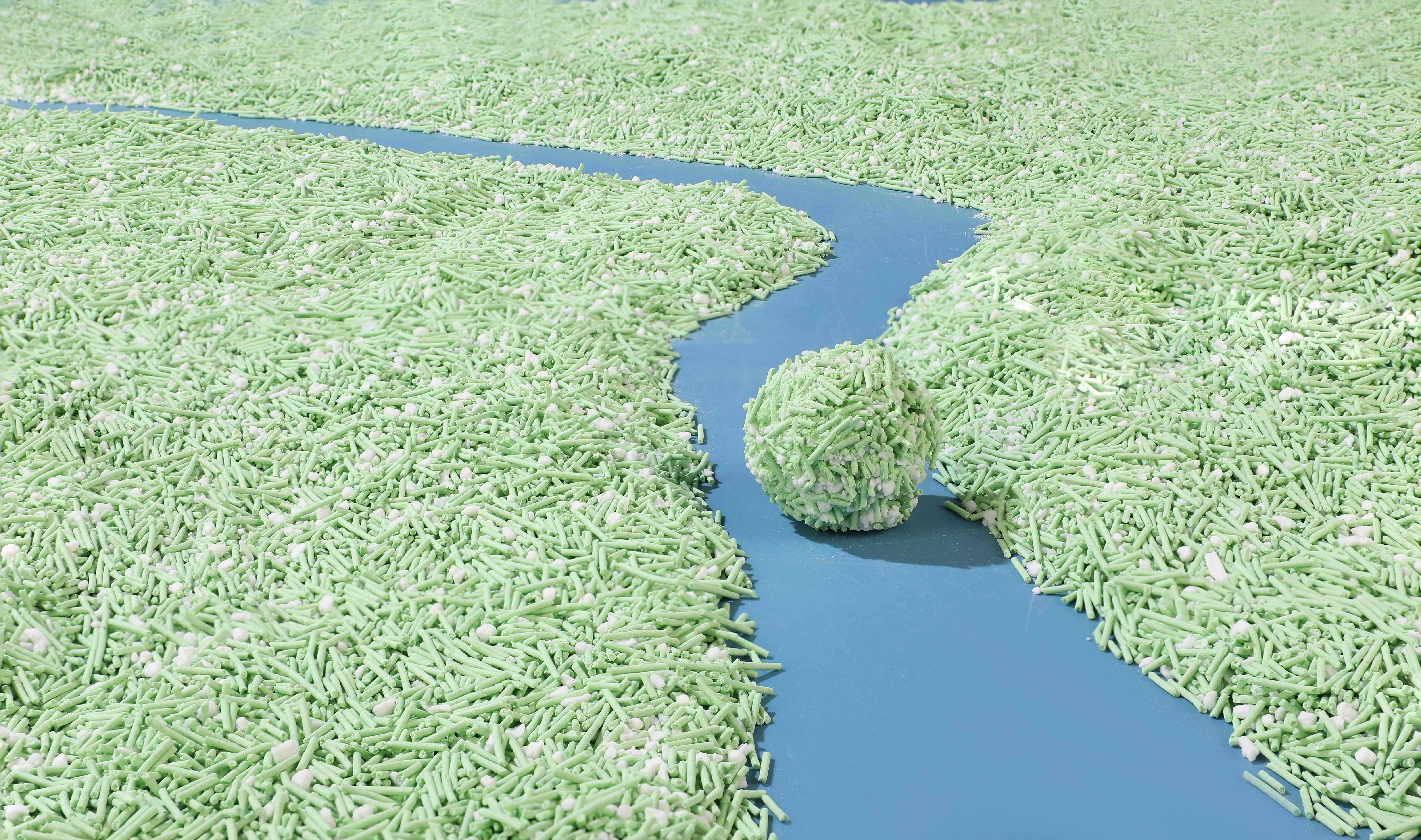 Tofu con sabor a té verde mezclado con arena para gatos de yuca