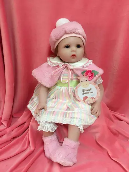 22" Winding pink silicone vinyl doll
