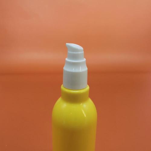 Gelbe Lotion Glasflasche mit Pumpe