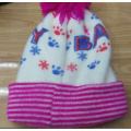 Bonnet bébé en tricot avec bonnet d&#39;hiver au crochet