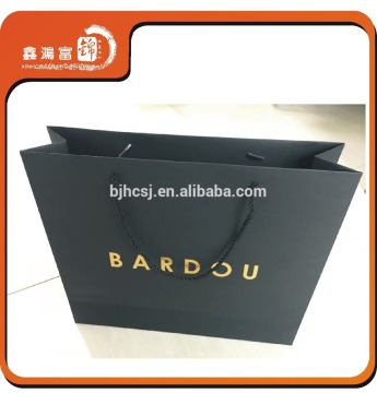 XHFJ Top quality flexo printing logo custom paper bag for clothing