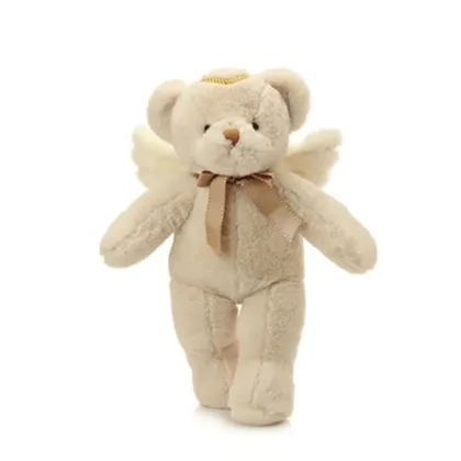 A large stuffed teddy bear on the bed