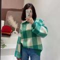 Pull femme en maille de laine à carreaux vert