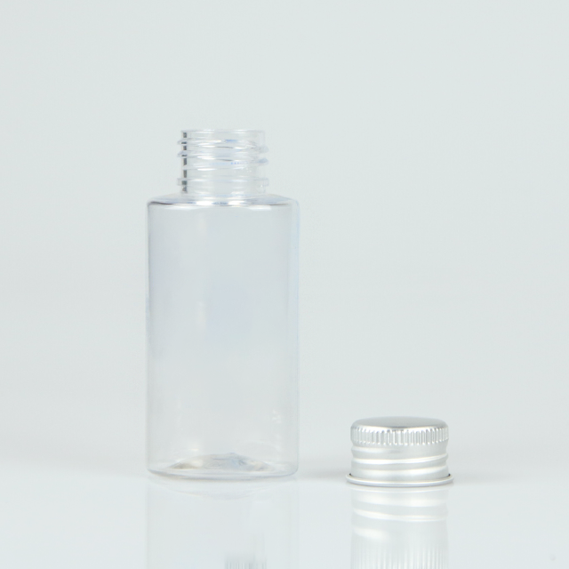 Flat oval plastic pet bottle with aluminum cap