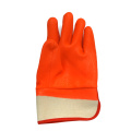 Fluoreszierender orange. Kalter PVC-beschichteter Handschuh