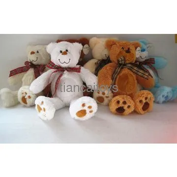 plush bear with ribbon